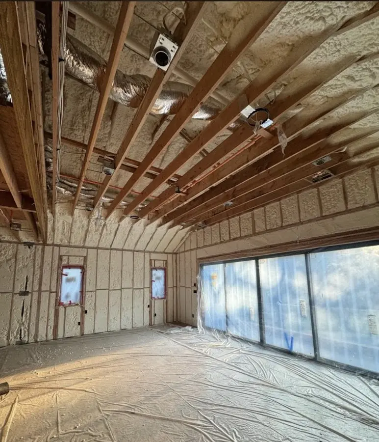 Interior walls and ceiling insulated with spray foam during new construction in Lakeside